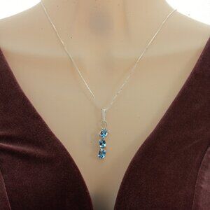 Elegant 3 stone Genuine Blue Topaz Pendant Necklace in Sterling Silver